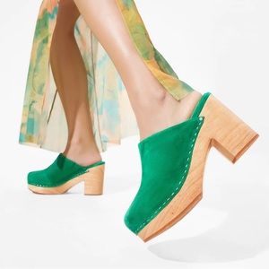 Charlotte Stone wooden clogs.